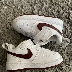 Kids White and Red Nike Shoes